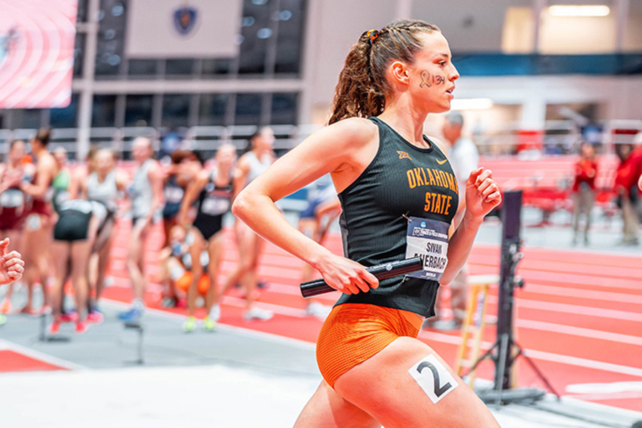 A woman competes in a track and field event. A woman competes in a track and field event.