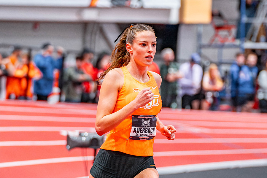 A woman competes during a track race. A woman competes during a track race.
