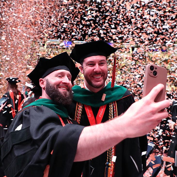 OSU-COM graduates take a photo following commencement ceremony OSU-COM graduates take a photo following commencement ceremony