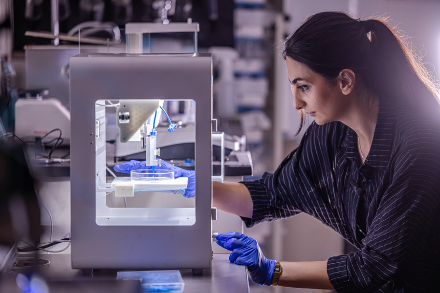 Female worker in manufacturing lab