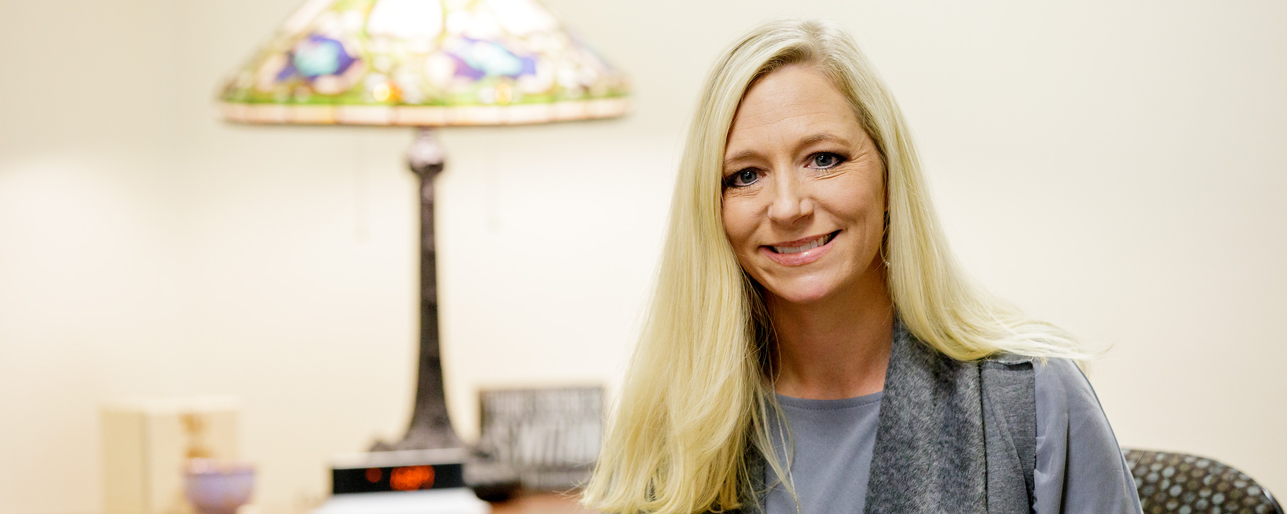  Dr. Richardson smiles in her office.