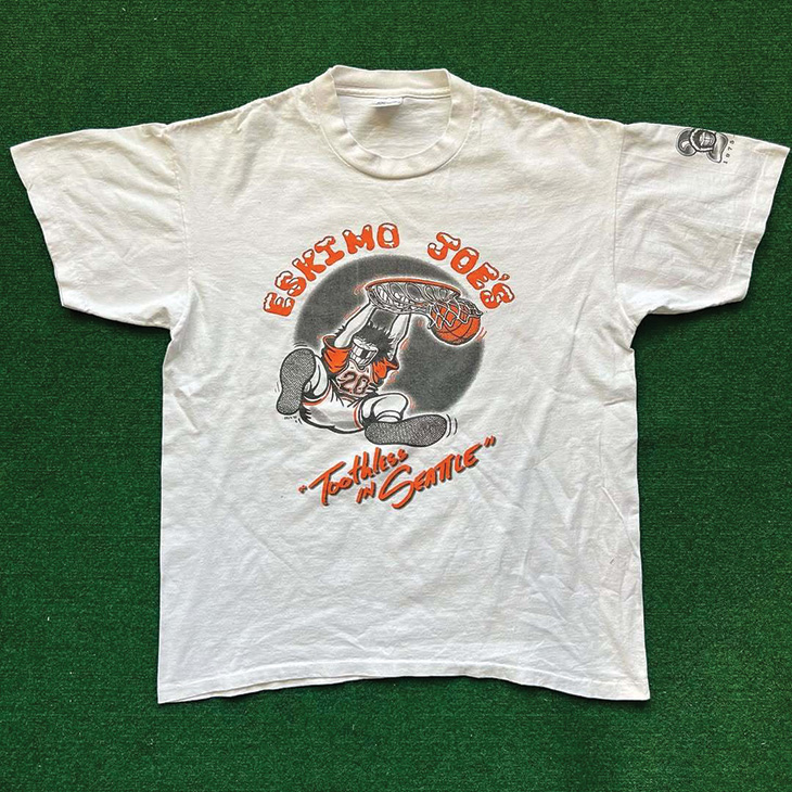A Classic Eskimo Joes t-shirt design A famous Staubus design is this T-shirt, inspired by Cowboy basketball player Scott Pierce losing a tooth during an Elite Eight game against UMass. Eskimo Joe’s quickly made this shirt for the Cowboys’ 1995 Final Four appearance in Seattle.