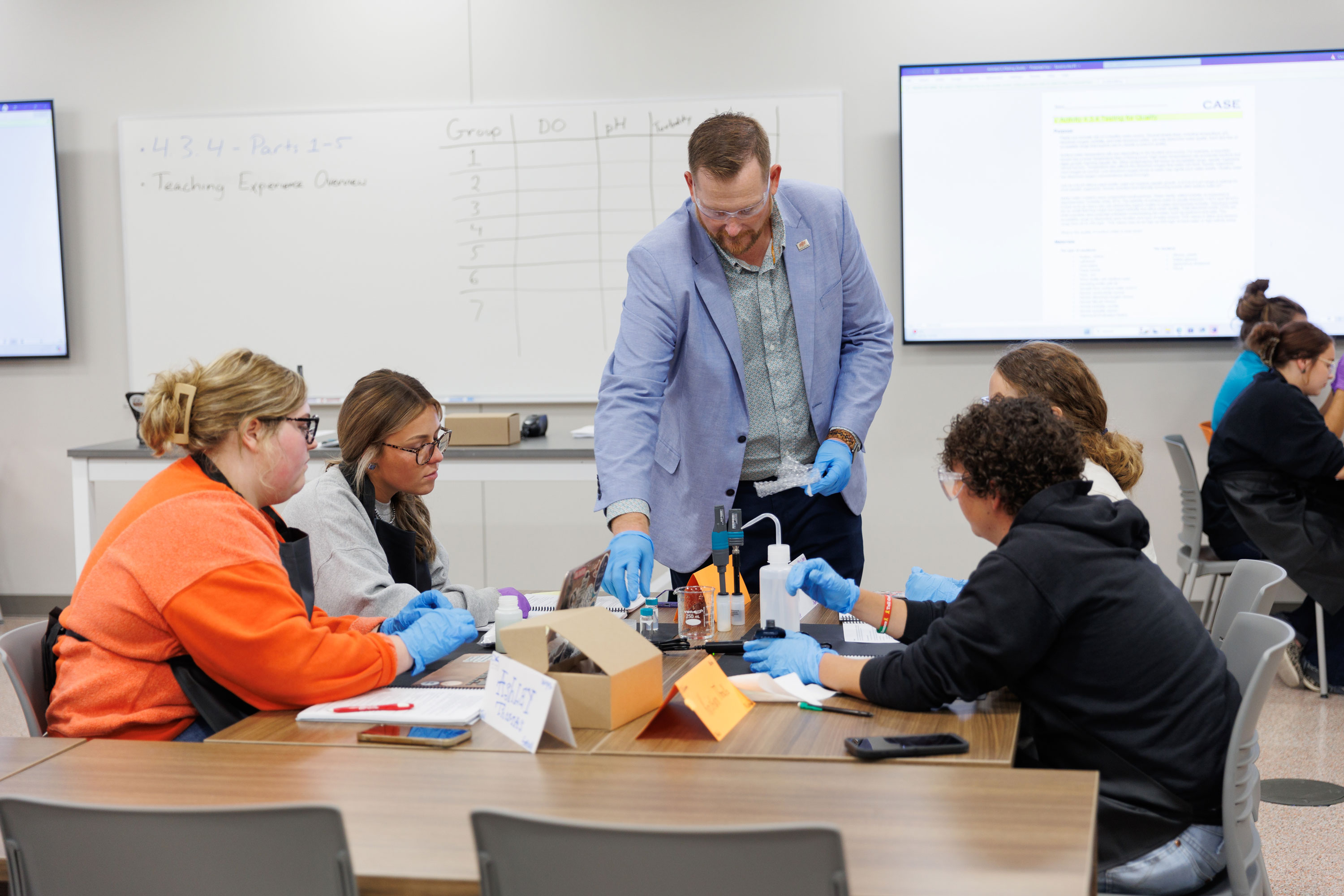 Dr. Chris Eck, agricultural education assistant professor, teaches students in the Bob Terry CASE Teaching Lab in Agricultural Hall. Dr. Chris Eck, agricultural education assistant professor, teaches students in the Bob Terry CASE Teaching Lab in Agricultural Hall.
